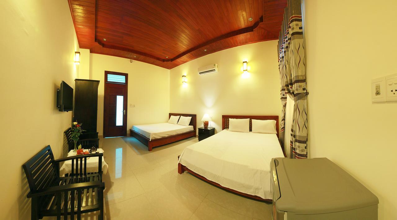 Sunrise Homestay Хойан Экстерьер фото